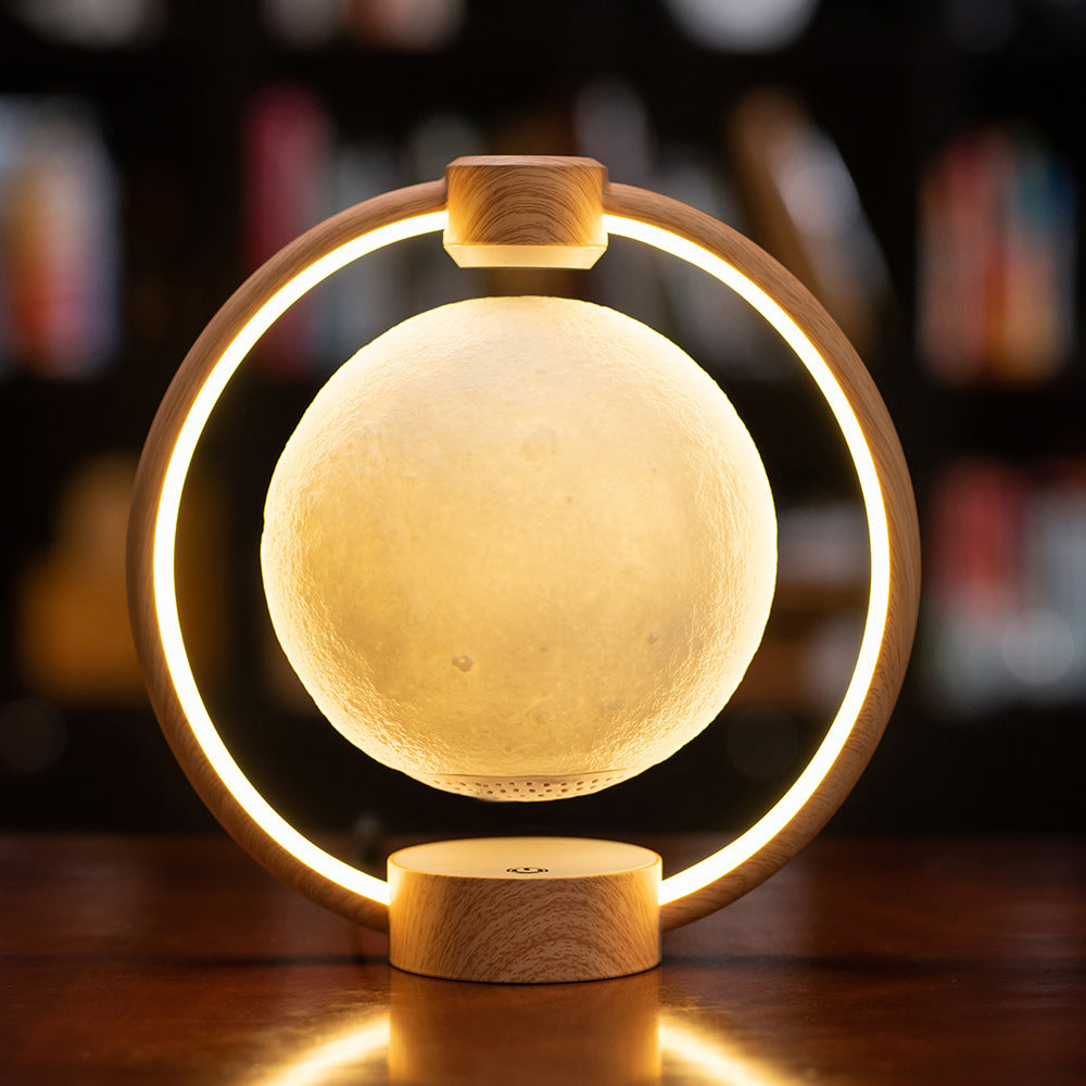 K1-Round Moon Bluetooth Speaker – 6D Surround Sound, Floating Moon Design with Colorful LED Lights & Remote Control